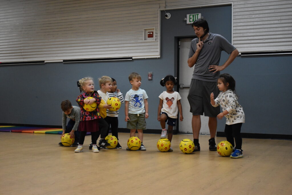 A coach helps class make choices to do the right thing.